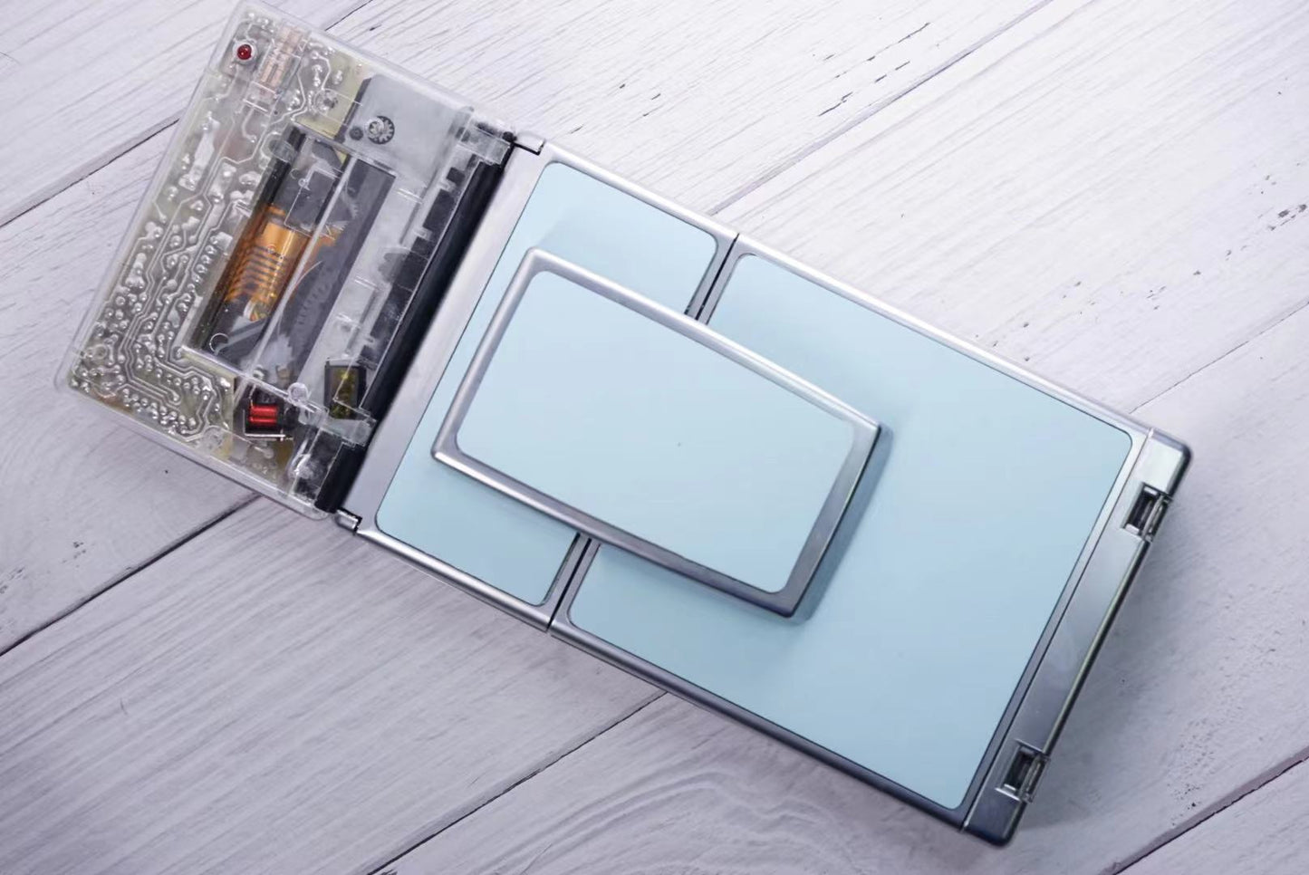 Polaroid SLR680 Transparent vision ISO600 BABY BLUE Shutter button