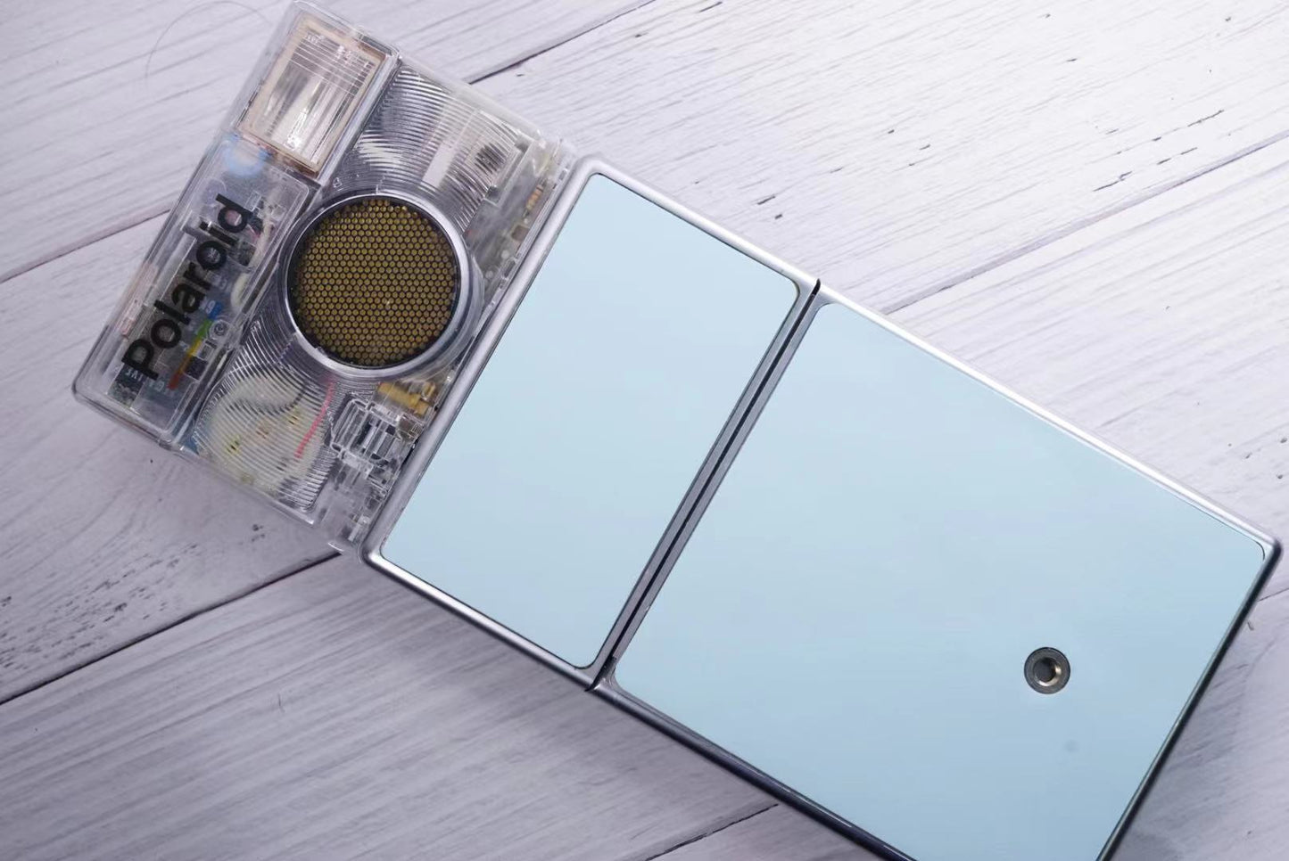 Polaroid SLR680 Transparent vision ISO600 BABY BLUE Shutter button