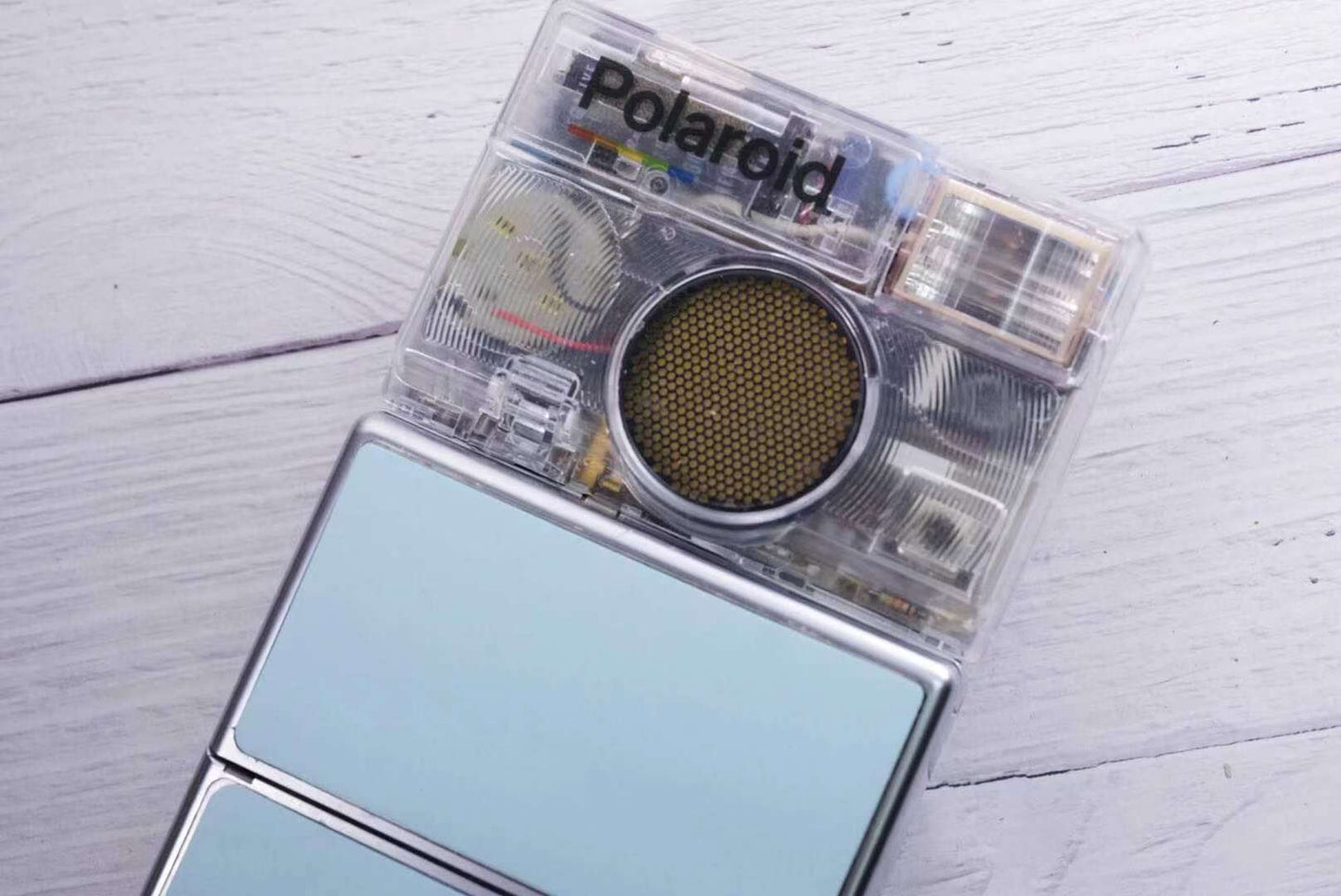 Polaroid SLR680 Transparent vision ISO600 BABY BLUE Shutter button