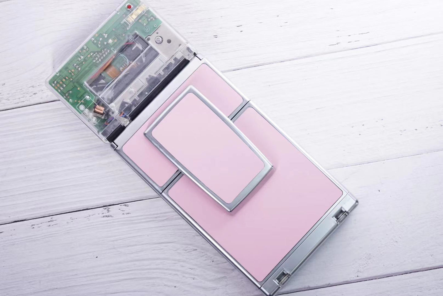 Polaoid SLR 690 PINK Custom Edition transparent and sliver body