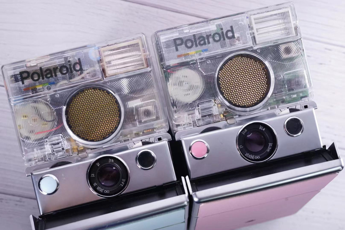 Polaoid SLR 690 PINK Custom Edition transparent and sliver body
