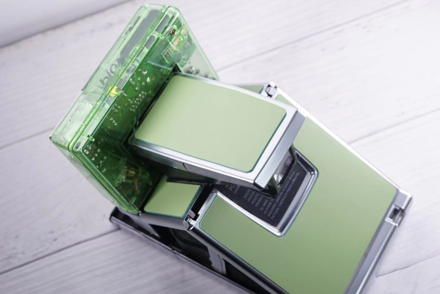 Polaoid SLR 690 Emerald green Custom Edition transparent