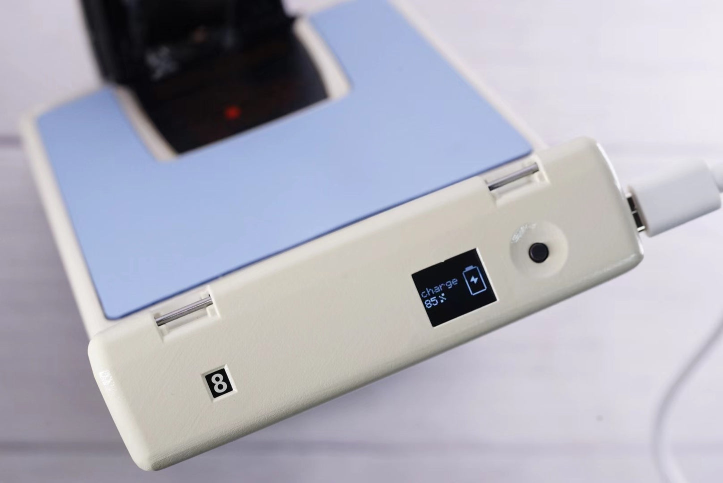 Power kit evo*Polaroid SX70 SONAR Transparent vision ISO600 WHITE VERSION BLUE Shutter button