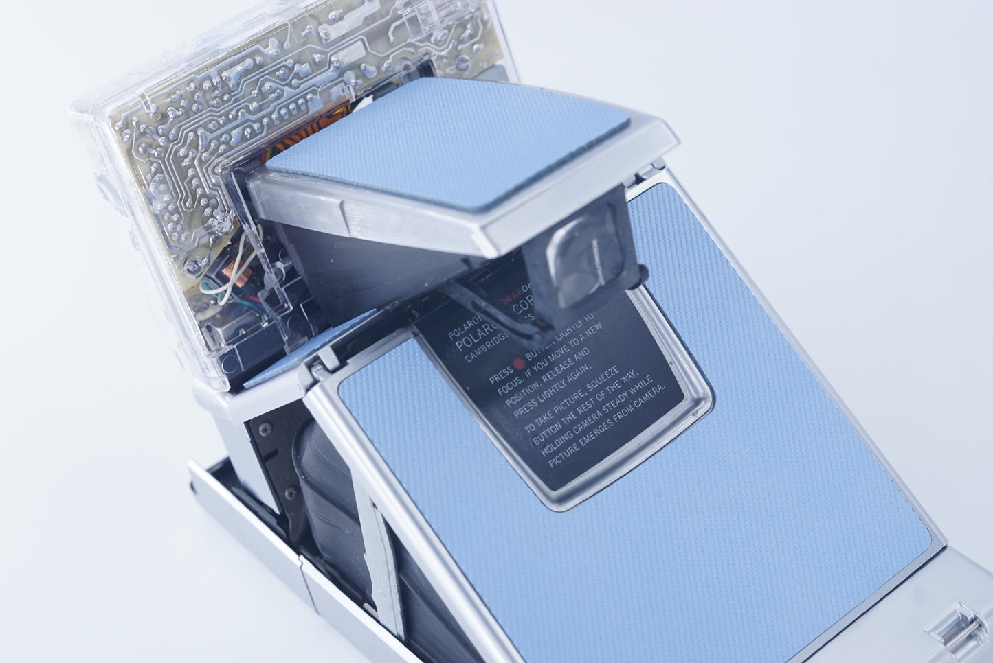 Polaroid SLR680 Transparent vision ISO600 SKY BLUE Shutter button