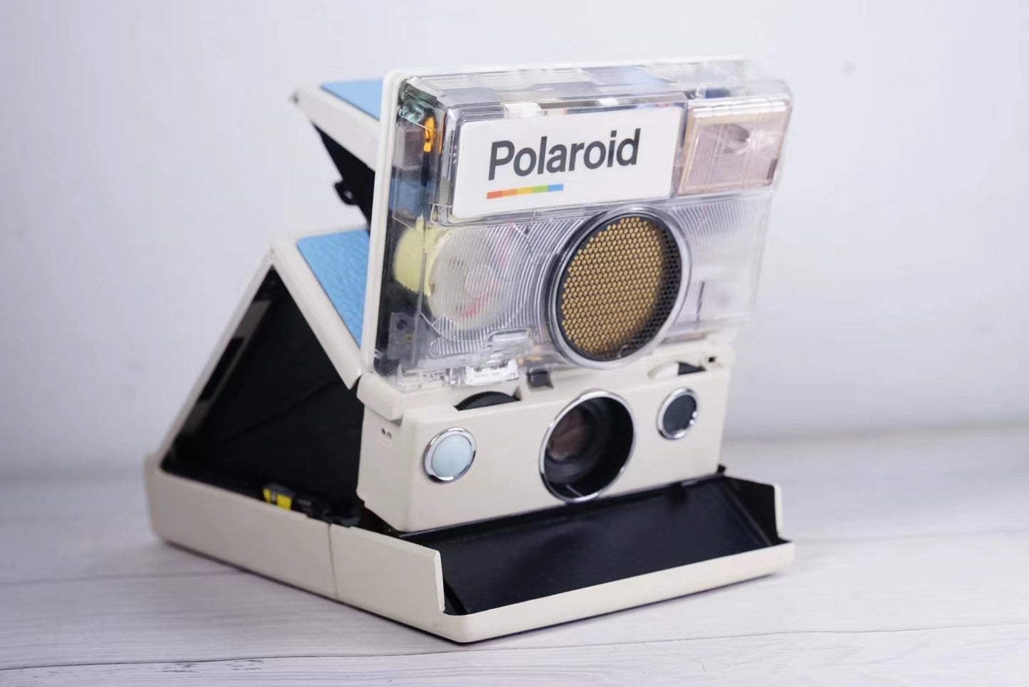 Polaroid SLR 680 White Body transparent Blue shutter button Custom Edition