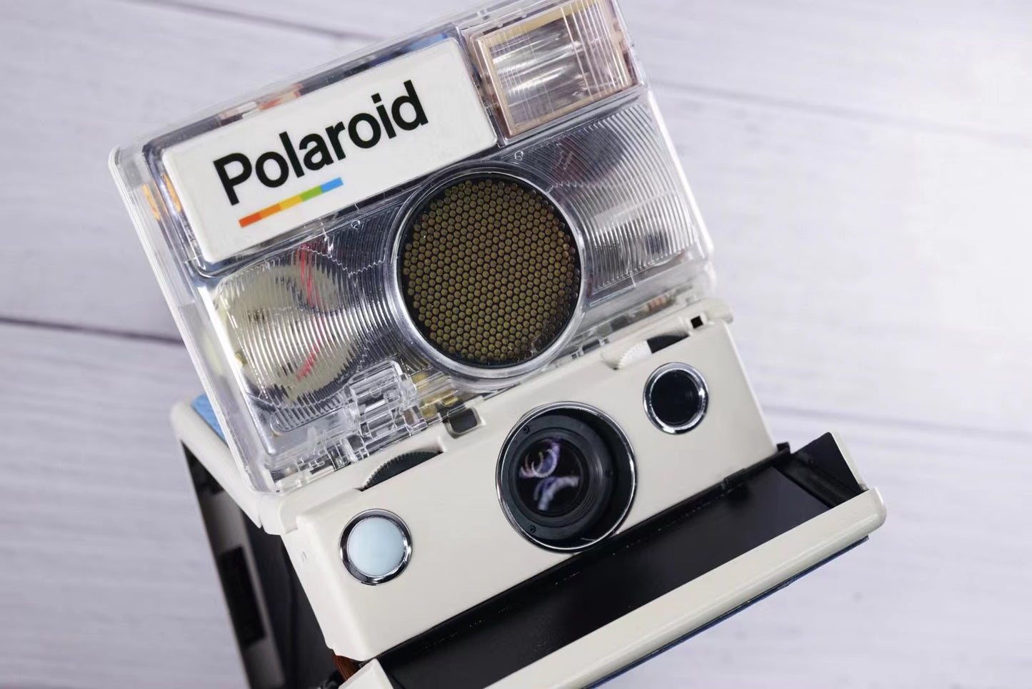 Polaroid SLR 680 White Body transparent Blue shutter button Custom Edition