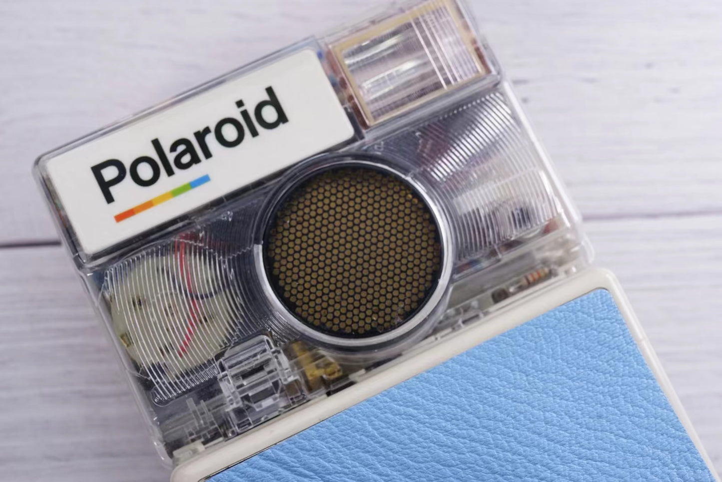 Polaroid SLR 680 White Body transparent Blue shutter button Custom Edition